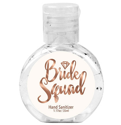 This sanitizing gel says BRIDE SQUAD in a pretty rose gold font with a lovely ivory background. This cute and affordable 62% alcohol hand sanitizer is the perfect sized party favor