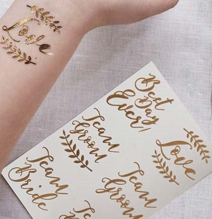 These temporary tattoos make the perfect bachelorette party accessory for all your guests. These rose gold tattoos say Best Day Ever, Love, Team Groom and Team Bride!