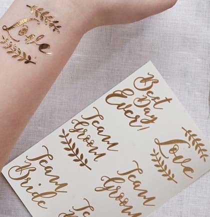 These temporary tattoos make the perfect bachelorette party accessory for all your guests. These rose gold tattoos say Best Day Ever, Love, Team Groom and Team Bride! 