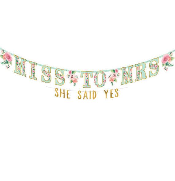 Having a Floral Themed Bachelorette Party and need banner ideas for the party? This banner kit comes with two banners. One large floral banner saying FROM MISS TO MRS. and a smaller sized banner saying SHE SAID YES in gold.