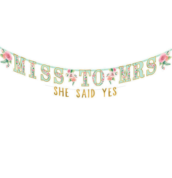 Having a Floral Themed Bachelorette Party and need banner ideas for the party? This banner kit comes with two banners. One large floral banner saying FROM MISS TO MRS. and a smaller sized banner saying SHE SAID YES in gold. 