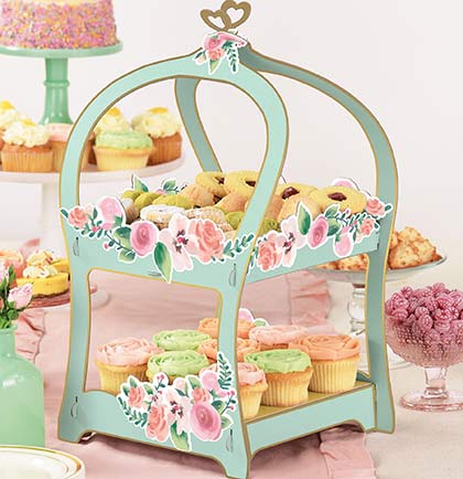 Your buffet table will look amazing with this pretty Floral Treat Stand. The 17" two tier mint and pastel floral stand holds 18 standard sized cupcakes or other yummy treats. Perfect for the bachelorette party or bridal shower. 