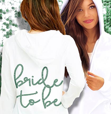 White lightweight hoodie with a green glitter Bride to Be back graphic.