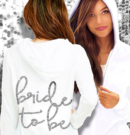 White Lightweight Hoodies with a Silver Glitter Bride To Be back graphic. 