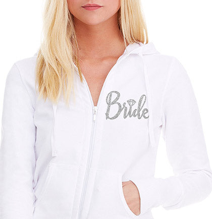 This hoodie has a glitter graphic on the front that says Bride in silver. This french terry hoodie is 95% cotton and 5% spandex.