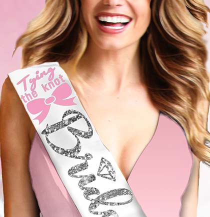 Pink Tying the Knot Silver Bride to Be on a white satin sash