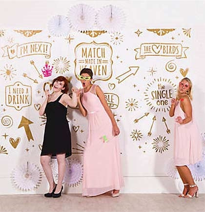 Have fun taking photos at a wedding reception, bachelorette party or bridal shower with this fun backdrop. This giant white and gold backdrop comes in three pieces and is big enough to hang on the wall.