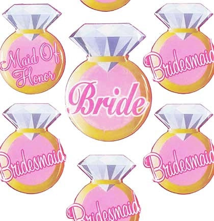 This set of 7 bridal party pins is a sweet accessory for the wedding party. Have them wear these party buttons to the rehearsal dinner or bridal shower identifying who they are. The ring shaped button set includes 1 &quot;Bride&quot; button, 5 &quot;Bridesmaid&quot; buttons and 1 &quot;Maid of Honor&quot; button.