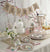These paper plates are perfect for a rustic themed bachelorette party or bridal party. The dinner plates feature a natural wood print and say "Mr. and Mrs." in a pretty script font. The plate is accented with a flower bouquet in a mason jar and a vintage lace pattern trim. Make sure to get the rest of the Rustic Wedding tableware collection to have a cohesive party look. 
