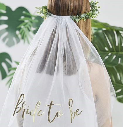 Have a bohemian bride who wants to stand out at her parties? This stunning plastic eucalyptus crown with white veil says 'Bride to Be' in a gold foil graphic. 