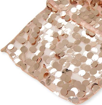 The 13"x108" rectangular table runner works on square, rectangle or round tables. The mesh and sequins runner is perfect for a bachelorette party.