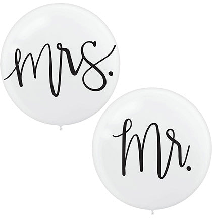 These Mr. &amp; Mrs. Balloons are perfect for the bride and groom to have as props for wedding pictures. The set includes one white balloon that says Mr. and the other Mrs. in a pretty black font. Tie a ribbon in the wedding colors to the bottom of this balloon for an added touch.