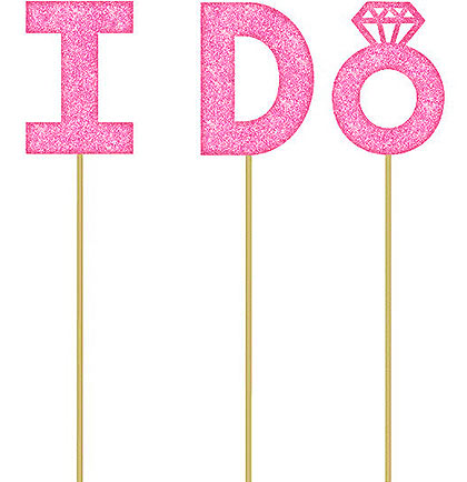 Decorate the bride&#39;s cake with this fun pick set. The set of three wooden picks each have a cardstock letter that will spell out I Do in pink glitter. An easy and pretty decoration for the bachelorette party or bridal shower. 