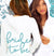 White lightweight hoodie with an aqua glitter Bride to Be back graphic. 