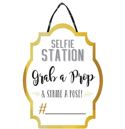 A must have at the bachelorette party or bridal shower is a space to take photo throughout the party. Create a fun space for the guests to take photos with an elaborate backdrop and photo props. This Selfie Station Sign is perfect to point people in the right direction. 