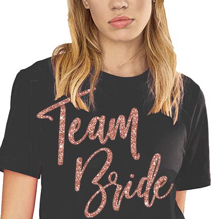 Show your support for the bride with these gorgeous Team Bride jersey tees! The tee has a bold rose gold glitter graphic for the team to stand out in the crowd. Get them this shirt as a gift for the bridal shower or bachelorette party!
